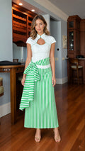 Model wearing white and green striped keyhole midi dress, front view