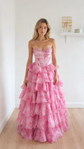 Front view of pink floral strapless corset ball gown