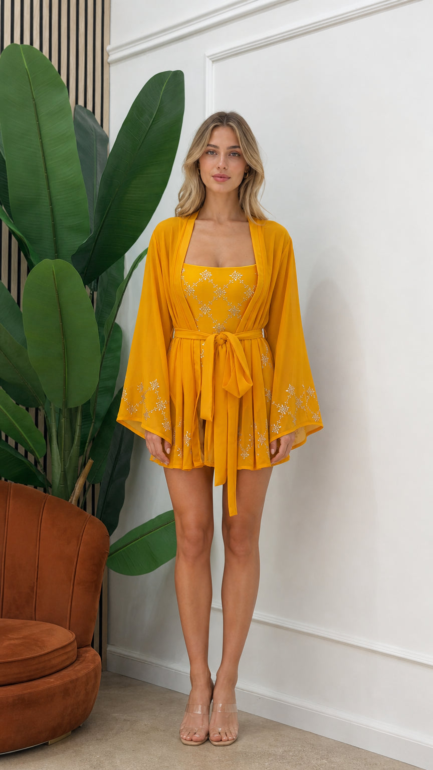 Front view of model wearing yellow embellished three-piece kimono set