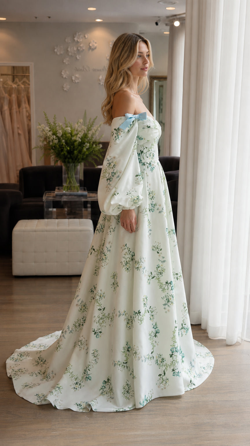 Side profile view of woman in white floral long sleeve gown