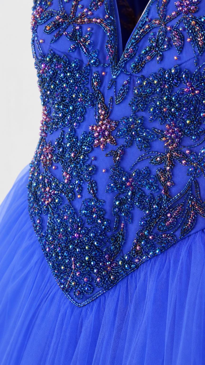 Close-up of beaded and embroidered bodice detail
