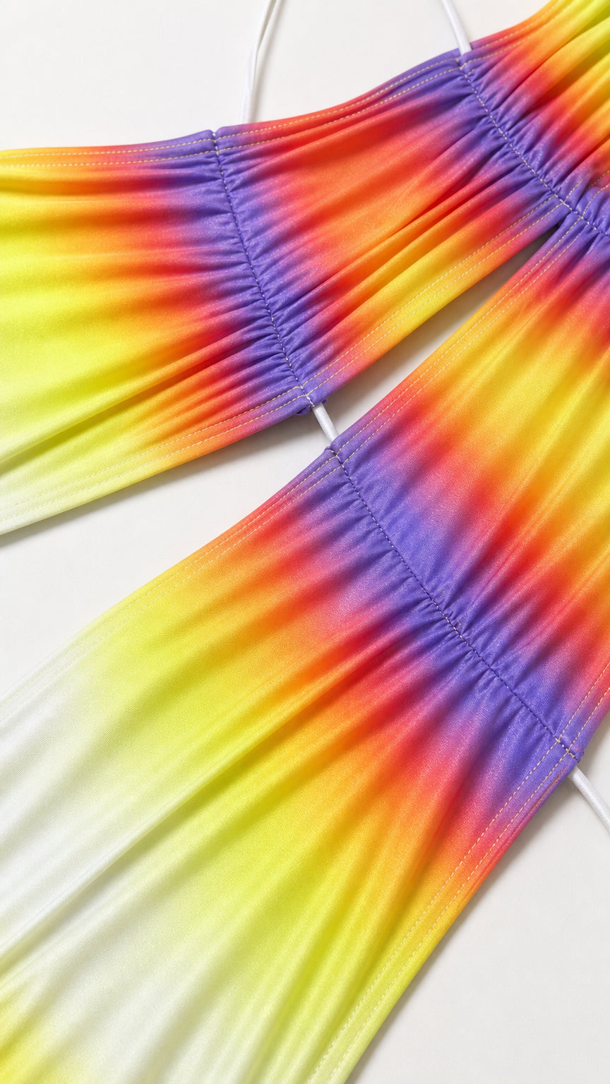 Close-up detail of ruched waist cutout and colorful gradient fabric